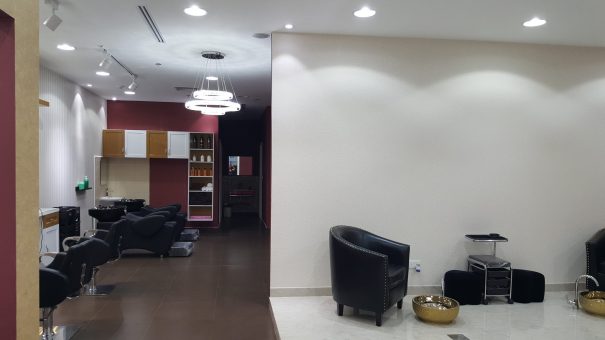 Glam look beauty salon Interiors displaying beauty products and tools